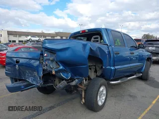 2005 Dodge Dakota SLT with VIN 1D7HE48N85S261745, listed as a IAAI auction lot 41401763 with 153,799 mi miles and . Bid and sale history available at DreamBid. Image 4.