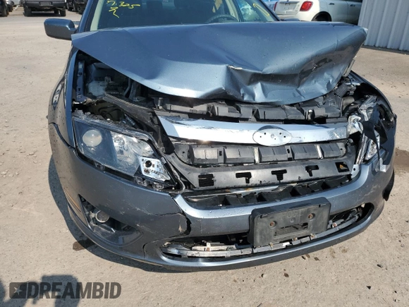 2012 Ford Fusion SE with VIN 3FAHP0HAXCR253493, listed as a Copart auction lot 63565455 with 126,582 mi miles and Salvage title. Bid and sale history available at DreamBid. Image 11.