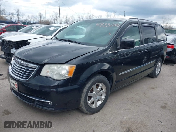 2013 Chrysler Town & Country Touring with VIN 2C4RC1BG5DR554662, listed as a IAAI auction lot 41833006 with 143,626 mi miles and . Bid and sale history available at DreamBid. Image 2.