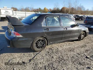 2006 Mitsubishi Lancer OZ-Rally with VIN JA3AJ86E16U059013, listed as a Copart auction lot 80056014 with 107,179 mi miles and Clean Title. Bid and sale history available at DreamBid. Image 3.