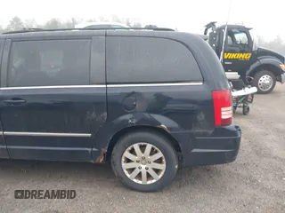 2010 Chrysler Town & Country Touring Plus with VIN 2A4RR8DX9AR495058, listed as a IAAI auction lot 42160125 with 171,860 mi miles. Bid and sale history available at carsss.com. Image 6.
