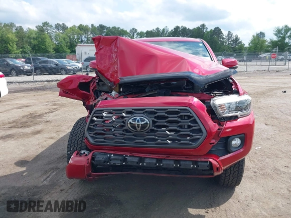 2021 Toyota Tacoma SR z VIN 5TFCZ5AN2MX263159, wystawiony jako IAAI lot #42273087 z przebiegiem 69 220 mil mil oraz . Historia ofert i sprzedaży dostępna na DreamBid. Obrazek 11.