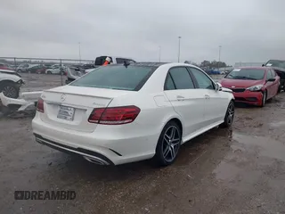2014 Mercedes-Benz E 550 Sport with VIN WDDHF9BB3EB017140, listed as a IAAI auction lot 41424799 with 32,537 mi miles and . Bid and sale history available at DreamBid. Image 4.