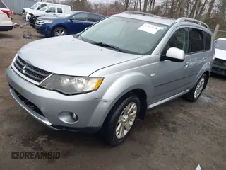 2009 Mitsubishi Outlander SE z VIN JA4MT31W89Z003101, wystawiony jako IAAI lot #41487678 z przebiegiem 90 226 mil mil oraz . Historia ofert i sprzedaży dostępna na DreamBid. Obrazek 2.
