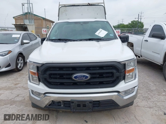 2021 Ford F-150 XL with VIN 1FTMF1CB7MKE81507, listed as a IAAI auction lot 41903595 with 71,860 mi miles and . Bid and sale history available at DreamBid. Image 12.