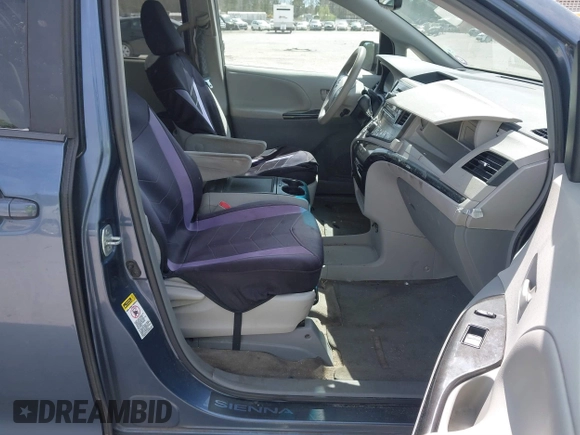 2014 Toyota Sienna LE AAS with VIN 5TDKK3DCXES498110, listed as a IAAI auction lot 41847116 with 242,065 mi miles and . Bid and sale history available at DreamBid. Image 5.