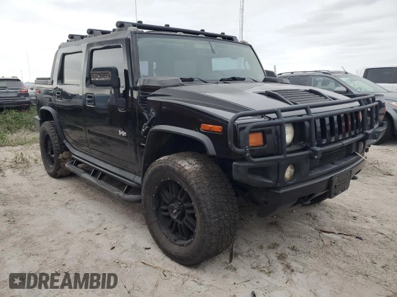 2006 Hummer H2 with VIN 5GRGN22U06H117601, listed as a Copart auction lot 76276744 with 0 mi miles and Non Repairable. Bid and sale history available at carsss.com. Image 4.