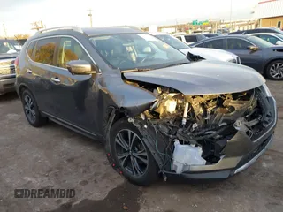 2017 Nissan Rogue SL z VIN 5N1AT2MT8HC867339, wystawiony jako IAAI lot #40955179 z przebiegiem 138 769 mil mil oraz . Historia ofert i sprzedaży dostępna na DreamBid. Obrazek 1.
