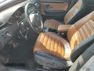 2013 Volkswagen CC VR6 Lux with VIN WVWHU7ANXDE506826, listed as a Copart auction lot 69210914 with 125,754 mi miles and Salvage Title. Bid and sale history available at carsss.com. Image 7.