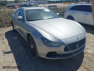 2017 Maserati Ghibli S with VIN ZAM57RSA6H1217209, listed as a IAAI auction lot 41704059 with 51,099 mi miles. Bid and sale history available at carsss.com. Image 1.