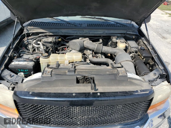2000 Ford Excursion Limited with VIN 1FMNU43S6YEC87756, listed as a Copart auction lot 67281054 with 180,254 mi miles and Non repairable. Bid and sale history available at DreamBid. Image 12.