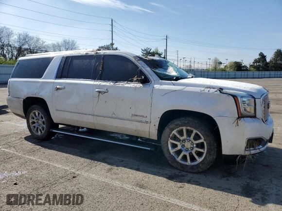 2017 GMC Yukon XL Denali with VIN 1GKS2HKJ5HR139365, listed as a Copart auction lot 52140725 with 135,079 mi miles and Salvage Title. Bid and sale history available at carsss.com. Image 4.