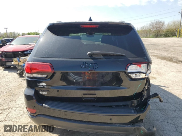 2018 Jeep Grand Cherokee Laredo E with VIN 1C4RJFAGXJC500377, listed as a Copart auction lot 54238755 with 64,617 mi miles and Salvage Title. Bid and sale history available at DreamBid. Image 6.