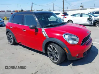 2014 MINI Countryman S with VIN WMWZC3C50EWP25784, listed as a IAAI auction lot 41881970 with 109,136 mi miles and . Bid and sale history available at DreamBid. Image 1.