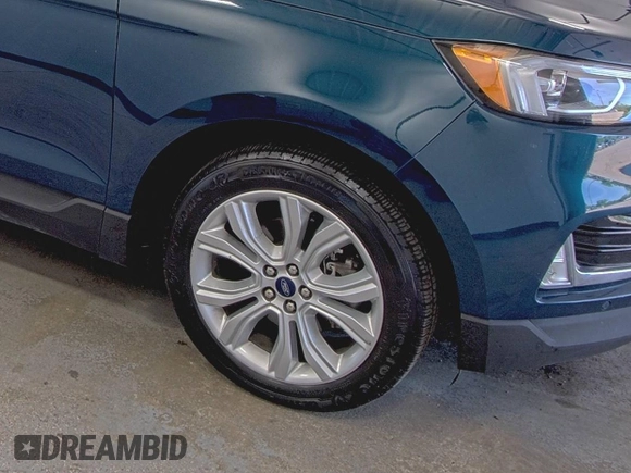 2020 Ford Edge Titanium z VIN 2FMPK3K91LBB37761, wystawiony jako IAAI lot #42829390 z przebiegiem 90 117 mil mil oraz . Historia ofert i sprzedaży dostępna na DreamBid. Obrazek 34.