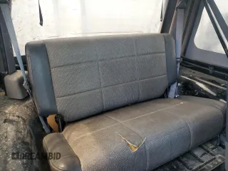 1999 Jeep Wrangler SE z VIN 1J4FY29P0XP479580, wystawiony jako Copart lot #63075455 z przebiegiem 160 986 mil mil oraz Szkoda całkowita • Salvage title. Historia ofert i sprzedaży dostępna na DreamBid. Obrazek 10.