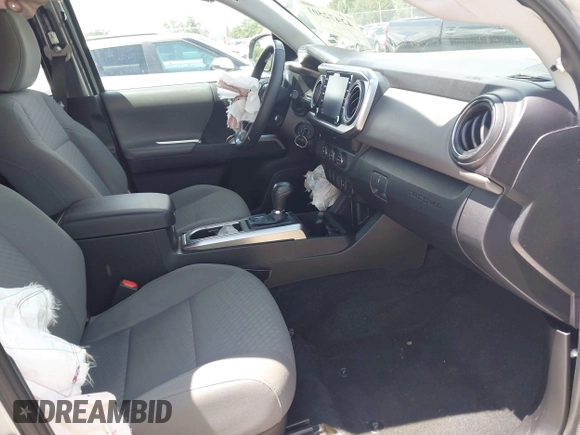 2023 Toyota Tacoma SR with VIN 3TYAX5GN0PT090132, listed as a IAAI auction lot 42472501 with 28,979 mi miles and . Bid and sale history available at DreamBid. Image 5.