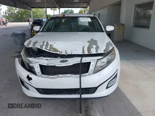 2015 Kia Optima EX z VIN 5XXGN4A72FG350868, wystawiony jako IAAI lot #42242887 z przebiegiem 222 208 mil mil oraz . Historia ofert i sprzedaży dostępna na DreamBid. Obrazek 13.
