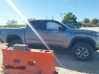 2024 GMC Canyon 4WD AT4X with VIN 1GTP6EEK6R1250127, listed as a IAAI auction lot 41823196 with 1,574 mi miles and . Bid and sale history available at carsss.com. Image 13.