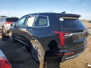 2021 Cadillac XT6 Premium Luxury z VIN 1GYKPCRS5MZ110015, wystawiony jako Copart lot #49323935 z przebiegiem 28 453 mil mil oraz Czysty tytuł • Clean title. Historia ofert i sprzedaży dostępna na DreamBid. Obrazek 2.