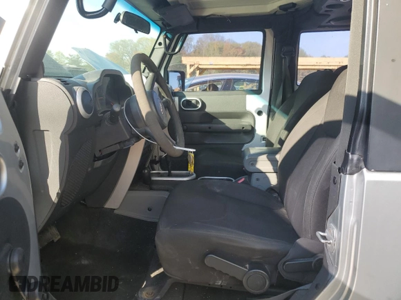 2009 Jeep Wrangler X with VIN 1J4FA24119L729880, listed as a Copart auction lot 54576155 with 173,959 mi miles and Clean Title. Bid and sale history available at DreamBid. Image 7.