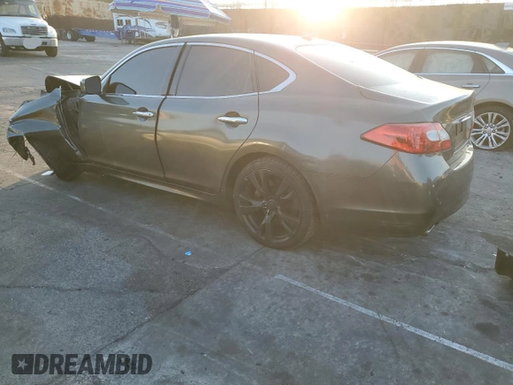2011 Infiniti M37 with VIN JN1BY1AP7BM320322, listed as a Copart auction lot 83215494 with 116,957 mi miles and Salvage Title. Bid and sale history available at carsss.com. Image 2.
