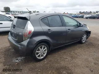 2012 Toyota Prius c One with VIN JTDKDTB35C1015243, listed as a IAAI auction lot 41692077 with 304,394 mi miles. Bid and sale history available at carsss.com. Image 4.