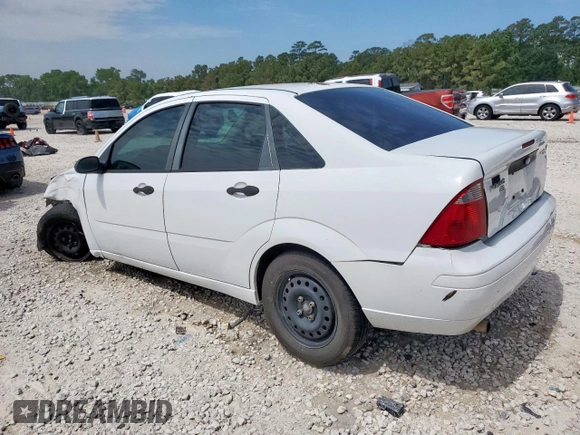 2007 Ford Focus S with VIN 1FAHP34NX7W225626, listed as a Copart auction lot 58202395 with 157,844 mi miles and Salvage title. Bid and sale history available at DreamBid. Image 2.
