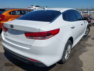 2017 Kia Optima LX with VIN 5XXGT4L31HG170655, listed as a IAAI auction lot 41850725 with 113,619 mi miles. Bid and sale history available at carsss.com. Image 4.