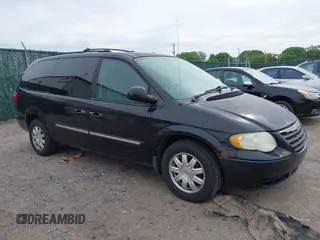 2005 Chrysler Town & Country Touring with VIN 2C4GP54L45R277761, listed as a IAAI auction lot 42144191 with 140,864 mi miles and . Bid and sale history available at DreamBid. Image 1.