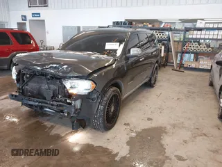 2011 Dodge Durango Citadel with VIN 1D4SE5GT6BC632724, listed as a IAAI auction lot 41590123 with 118,509 mi miles and . Bid and sale history available at DreamBid. Image 2.