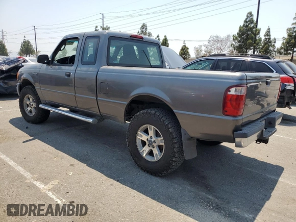 2005 Ford Ranger XL with VIN 1FTZR15E45PA73118, listed as a Copart auction lot 64683135 with 162,514 mi miles and Salvage title. Bid and sale history available at DreamBid. Image 2.