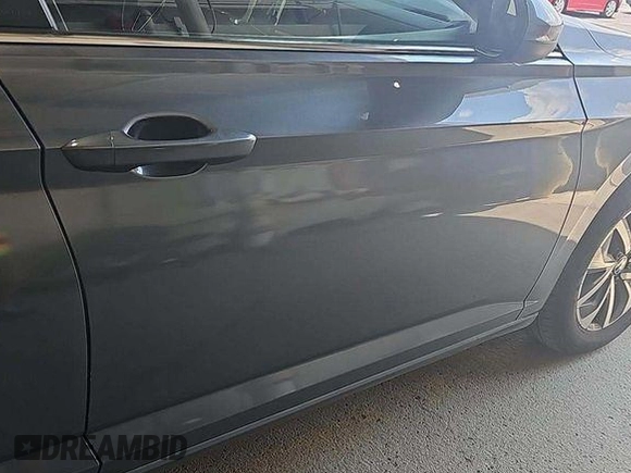 2024 Volkswagen Jetta S with VIN 3VW5M7BU2RM043054, listed as a IAAI auction lot 42852875 with 27,670 mi miles and . Bid and sale history available at DreamBid. Image 12.