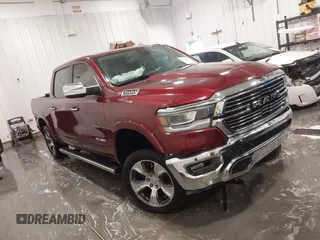 2020 Ram 1500 Laramie z VIN 1C6SRFJT5LN109384, wystawiony jako IAAI lot #42290125 z przebiegiem 73 629 mil mil oraz . Historia ofert i sprzedaży dostępna na DreamBid. Obrazek 1.