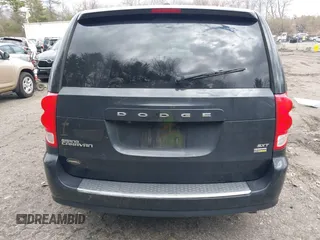 2019 Dodge Grand Caravan SXT with VIN 2C4RDGCG9KR804867, listed as a IAAI auction lot 42032311 with 157,351 mi miles and . Bid and sale history available at DreamBid. Image 16.