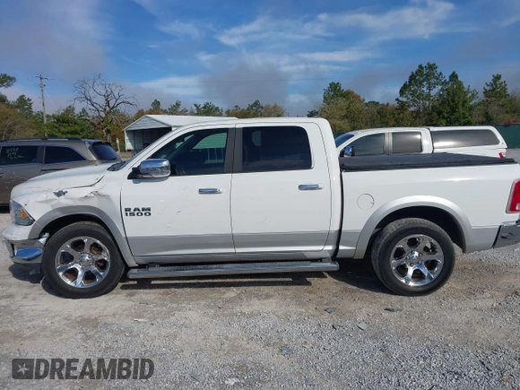 2017 Ram 1500 Laramie z VIN 1C6RR6NG9HS556255, wystawiony jako IAAI lot #41889626 z przebiegiem 90 141 mil mil oraz . Historia ofert i sprzedaży dostępna na DreamBid. Obrazek 14.