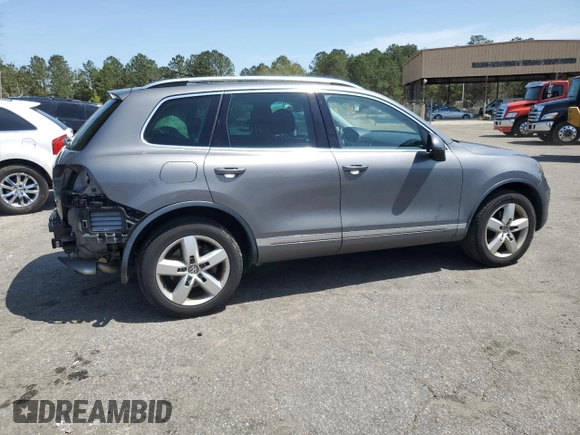 2012 Volkswagen Touareg Sport with VIN WVGEF9BP0CD010197, listed as a Copart auction lot 48480355 with 131,605 mi miles and Salvage Title. Bid and sale history available at DreamBid. Image 3.
