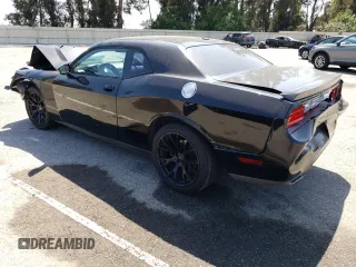 2011 Dodge Challenger z VIN 2B3CJ4DGXBH604602, wystawiony jako Copart lot #60917935 z przebiegiem Nie podano mil oraz Szkoda całkowita • Salvage title. Historia ofert i sprzedaży dostępna na DreamBid. Obrazek 2.
