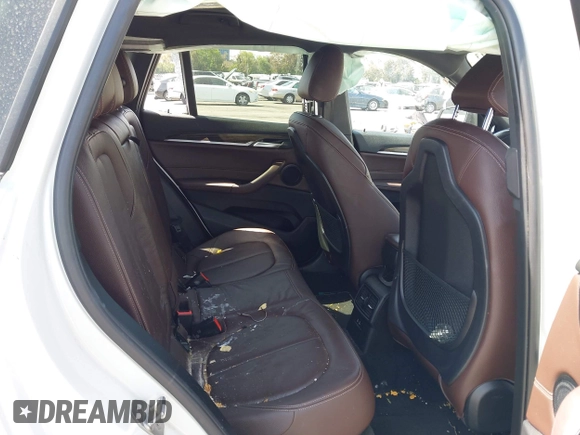 2020 BMW X1 xDrive28i with VIN WBXJG9C04L5R18165, listed as a IAAI auction lot 42313313 with 46,815 mi miles and . Bid and sale history available at DreamBid. Image 8.