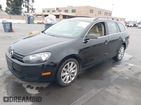 2012 Volkswagen Jetta SportWagen TDI with VIN 3VWPL7AJ3CM657816, listed as a IAAI auction lot 41473792 with 82,447 mi miles. Bid and sale history available at carsss.com. Image 2.