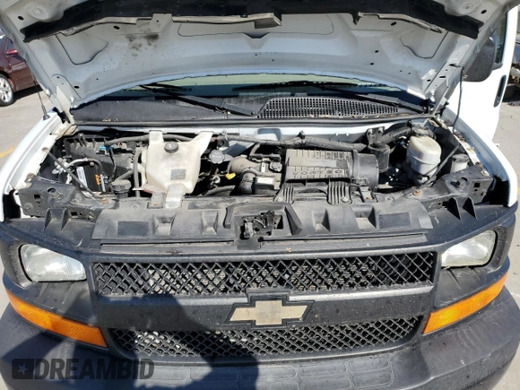2017 Chevrolet Express Cargo Van with VIN 1GCWGBFG7H1135696, listed as a Copart auction lot 77438324 with 100,675 mi miles and Salvage Title. Bid and sale history available at carsss.com. Image 12.