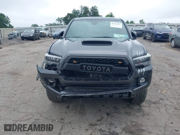 2022 Toyota Tacoma SR with VIN 3TMCZ5AN2NM507478, listed as a IAAI auction lot 42425907 with 40,796 mi miles and . Bid and sale history available at DreamBid. Image 6.