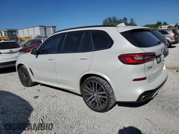 2019 BMW X5 xDrive40i with VIN 5UXCR6C50KLK86199, listed as a Copart auction lot 47523305 with 76,924 mi miles and Salvage Title. Bid and sale history available at DreamBid. Image 2.