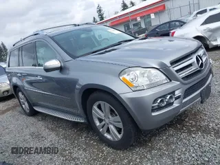 2010 Mercedes-Benz GL 450 with VIN 4JGBF7BE3AA595734, listed as a IAAI auction lot 41915822 with 133,367 mi miles and . Bid and sale history available at DreamBid. Image 1.