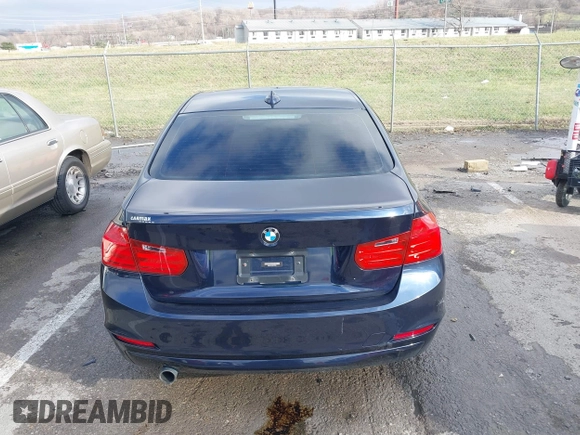 2013 BMW 3 Series 320i with VIN WBA3B1C58DK129051, listed as a IAAI auction lot 41119380 with 101,427 mi miles. Bid and sale history available at carsss.com. Image 17.
