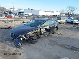 2015 Mazda 3 i SV with VIN JM1BM1T74F1246158, listed as a IAAI auction lot 41587923 with 147,001 mi miles. Bid and sale history available at carsss.com. Image 6.
