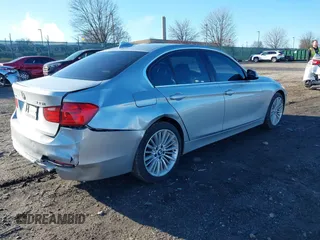 2014 BMW 3 Series 335i xDrive with VIN WBA3B9G55ENR90731, listed as a IAAI auction lot 41807046 with 45,752 mi miles and . Bid and sale history available at carsss.com. Image 4.
