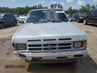 1991 Nissan Hardbody with VIN 1N6HD16S2MC396567, listed as a Copart auction lot 61949045 with 47,930 mi miles and Salvage title. Bid and sale history available at DreamBid. Image 5.