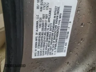 2010 Honda Odyssey Touring z VIN 5FNRL3H97AB082525, wystawiony jako Copart lot #56410845 z przebiegiem 94 819 mil mil oraz Szkoda całkowita • Salvage title. Historia ofert i sprzedaży dostępna na DreamBid. Obrazek 12.