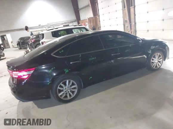 2014 Toyota Avalon Limited with VIN 4T1BK1EB0EU114093, listed as a IAAI auction lot 41311332 with 103,479 mi miles and . Bid and sale history available at DreamBid. Image 4.